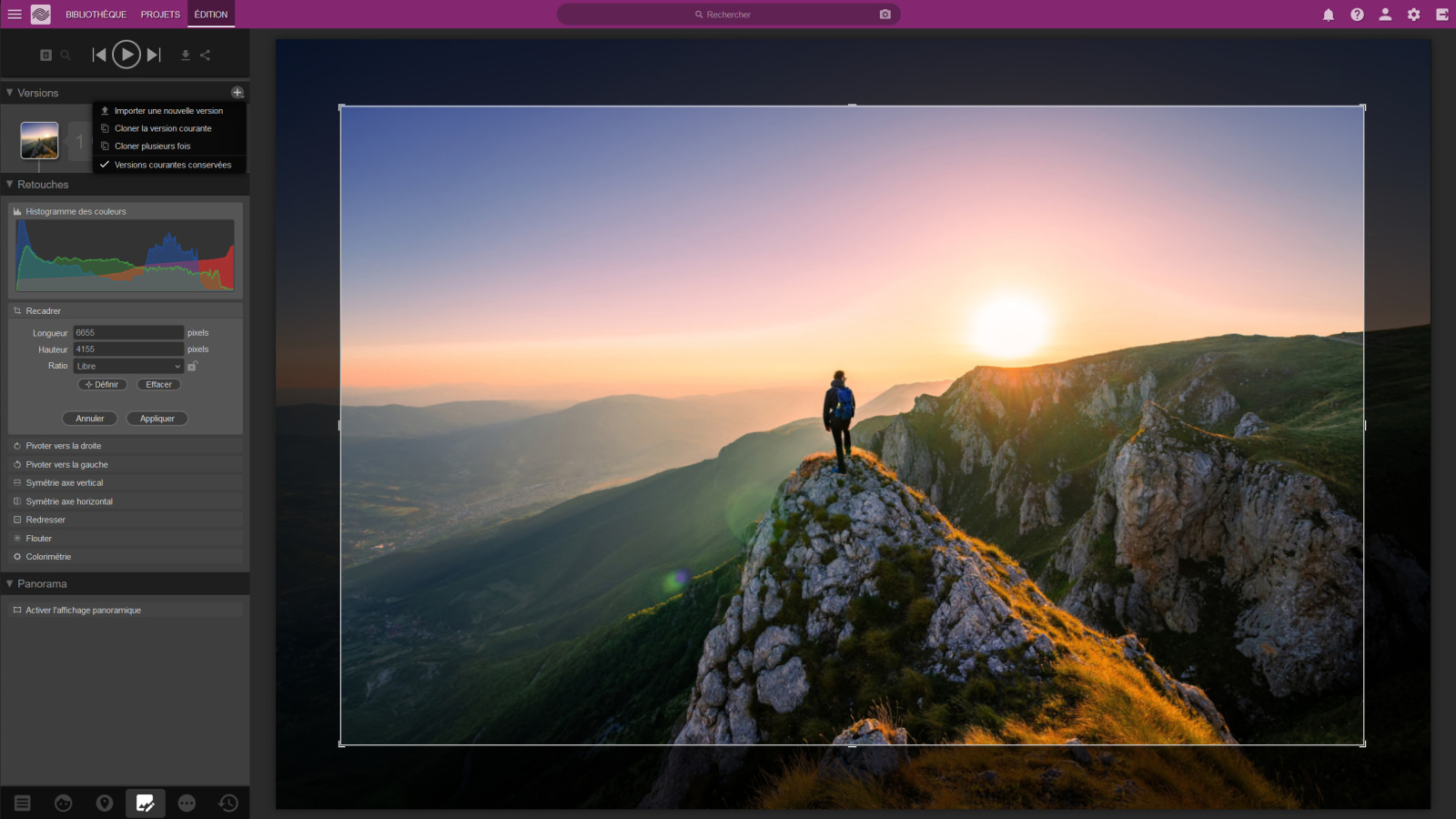 Capture d'écran d'Ephoto Dam avec la fonctionnalité de recadrage en cours d'utilisation. On peux également voir l'histogramme de couleurs et la gestion des versions