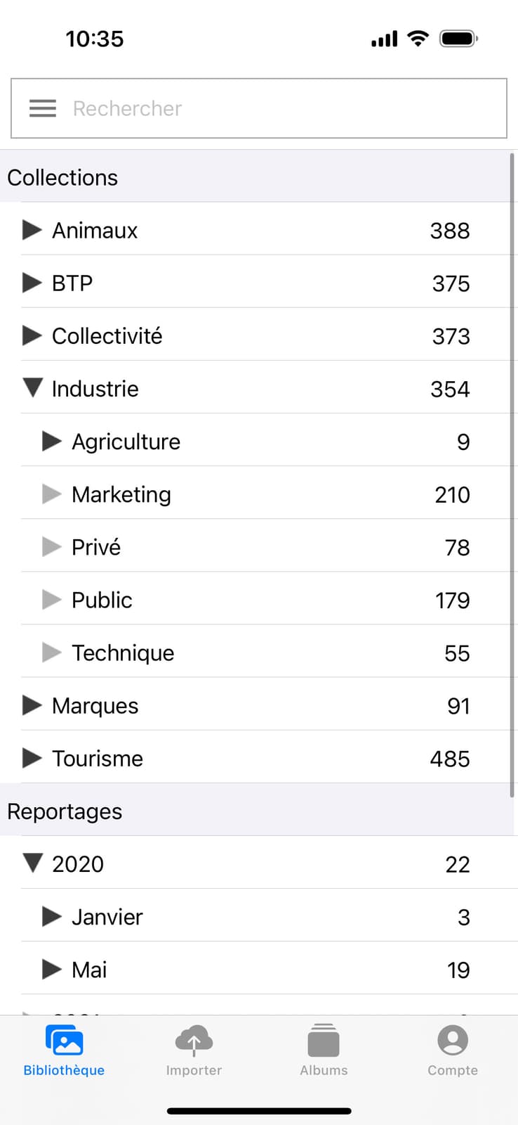 Écran de l'onglet Thesaurus où tous les mots clés sont centralisés de l'application mobile Ephoto Dam.